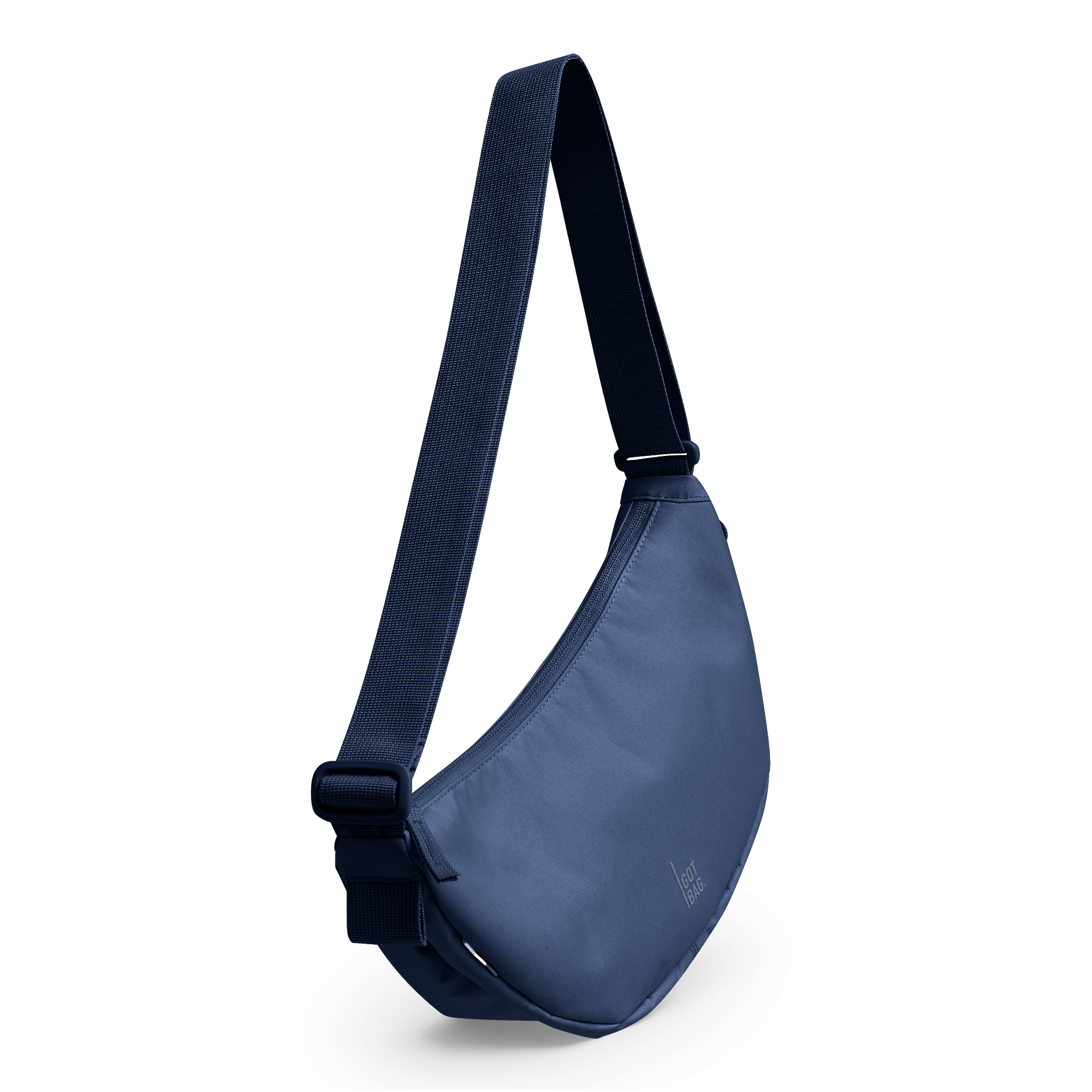 MOON BAG SMALL Tasche in dark ocean in diagonaler Ansicht.