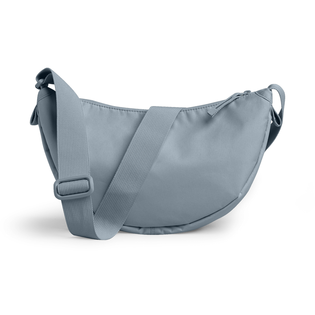 MOON BAG SMALL Monochrome Edition Tasche in marlin (grau-blau) als Studioaufnahme in Rückansicht.