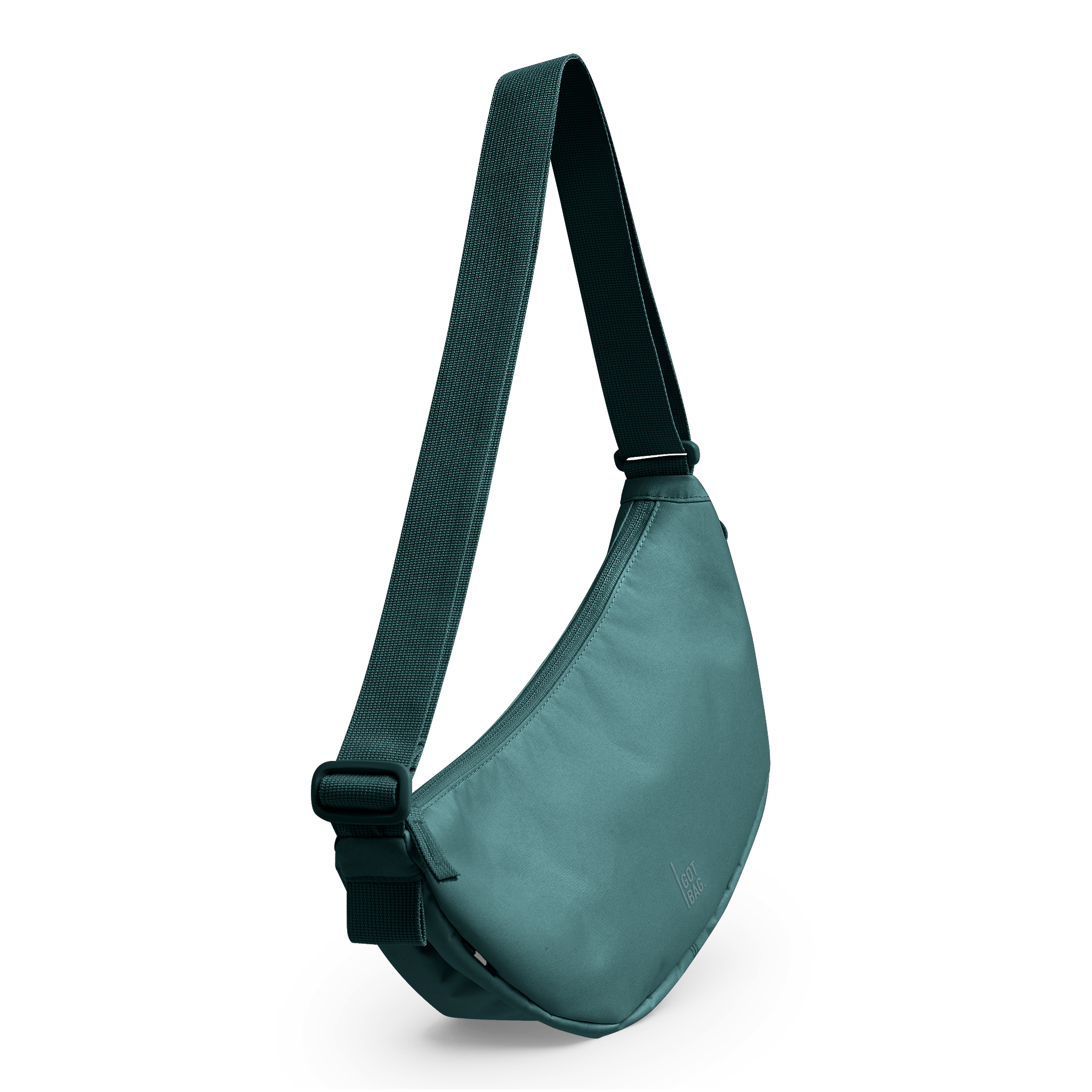MOON BAG Tasche in sea teal (kühles Türkisgrün) in diagonaler Ansicht.